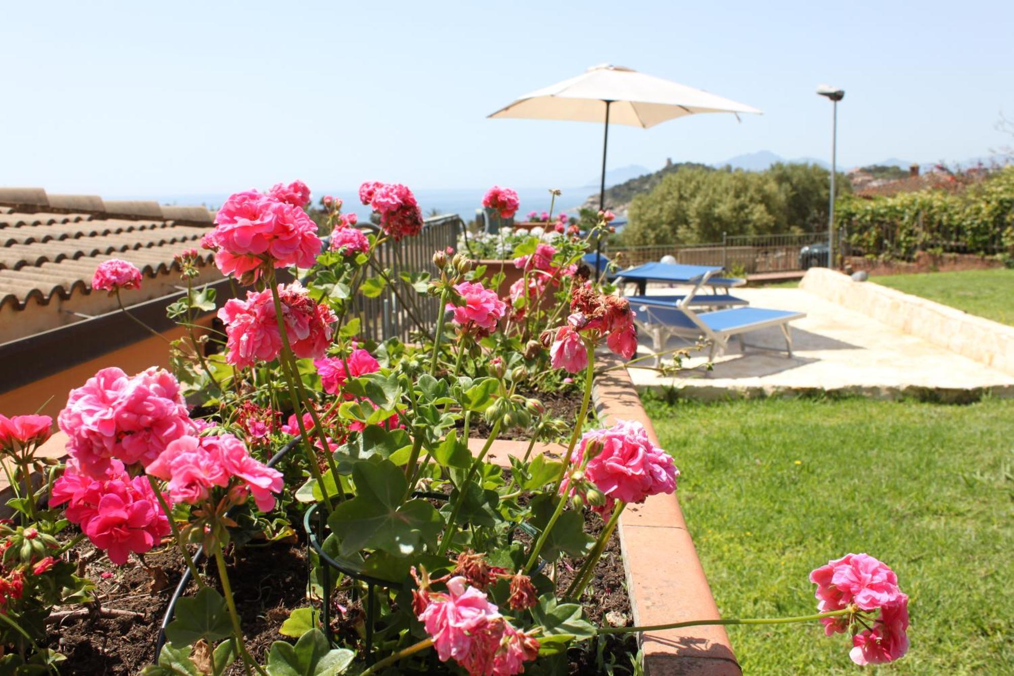 Arbatax Le Terrazze Sul Mare Aparthotel Bagian luar foto
